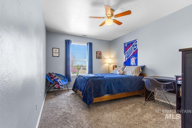 16042 N Saint Helens Dr, Nampa, ID 83651 - carpeted bedroom featuring ceiling fan, baseboards, a textured ceiling, and visible vents
