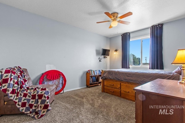 16042 N Saint Helens Dr, Nampa, ID 83651 - carpeted bedroom with a textured ceiling, baseboards, and ceiling fan