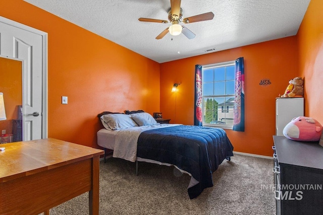 16042 N Saint Helens Dr, Nampa, ID 83651 - carpeted bedroom featuring baseboards, a ceiling fan, visible vents, and a textured ceiling
