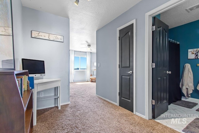 16042 N Saint Helens Dr, Nampa, ID 83651 - hall with a textured ceiling, carpet, visible vents, and baseboards