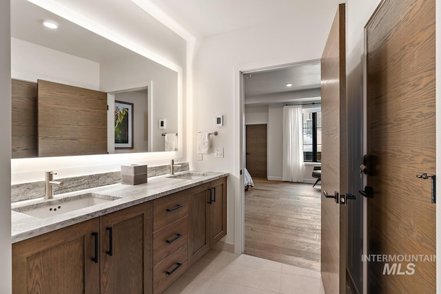 bathroom featuring tile patterned floors and vanity