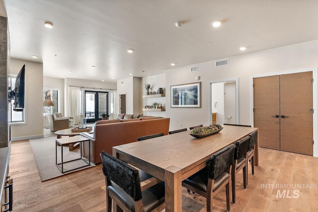 dining room featuring light wood-type flooring