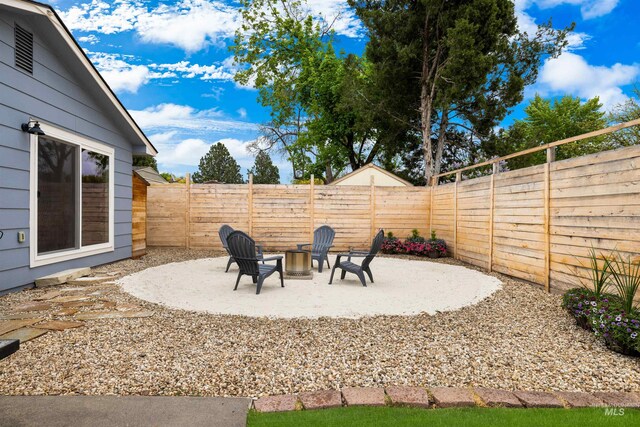view of yard with a patio and a fenced backyard