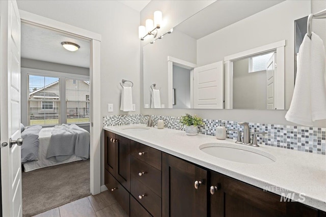 bathroom with vanity and backsplash