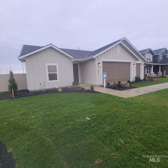 10165 W Napier Dr, Star, ID 83669 - view of front facade featuring a garage and a front lawn