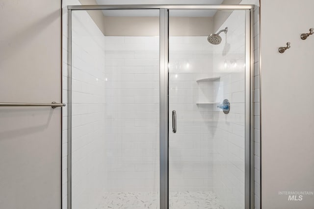 bathroom featuring a stall shower