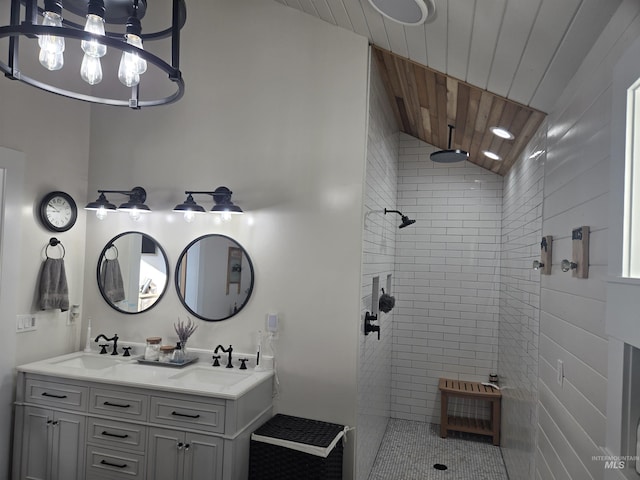 full bathroom featuring wooden ceiling, walk in shower, a sink, and double vanity
