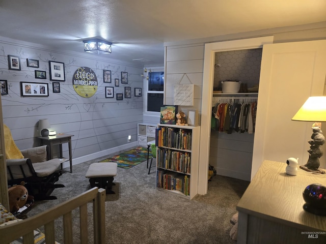 carpeted bedroom with a closet