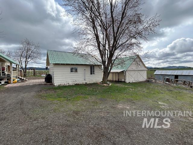 exterior space with an outbuilding and a barn