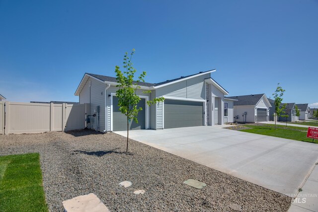 view of side of home with a garage