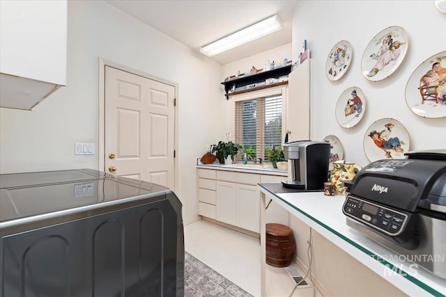 laundry area with washing machine and dryer