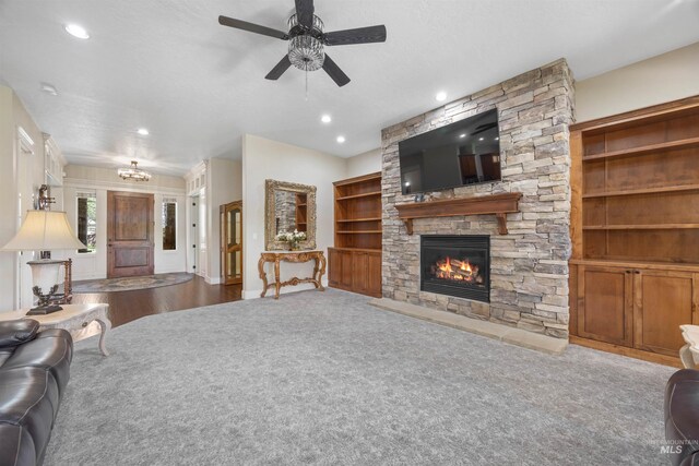 1573 E Commander St, Meridian, ID 83646 - living room with a fireplace, a ceiling fan, recessed lighting, and wood finished floors