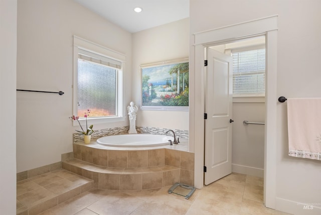 1573 E Commander St, Meridian, ID 83646 - bathroom with a bath, tile patterned flooring, healthy amount of natural light, and recessed lighting