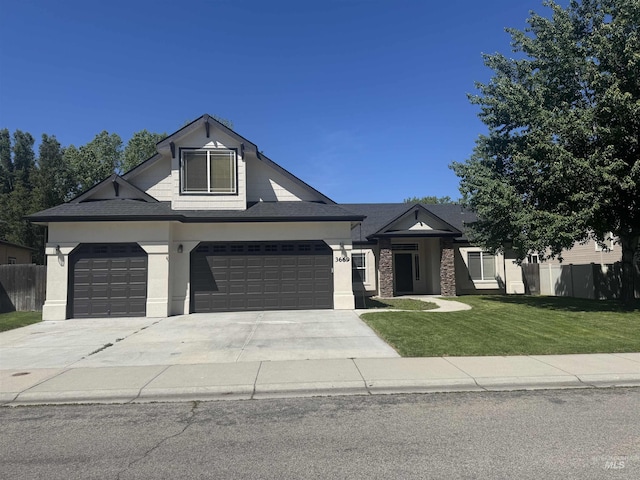 3669 N Dixon Ave, Meridian, ID 83646 - view of front of property with driveway, stucco siding, and a garage