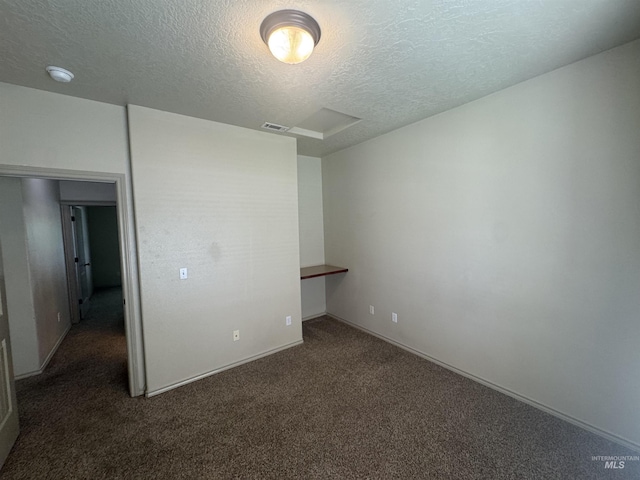 3669 N Dixon Ave, Meridian, ID 83646 - empty room featuring carpet floors, a textured ceiling, and baseboards