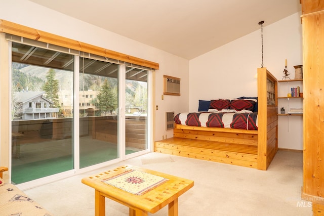 260 S 2nd Ave Unit 51, Ketchum, ID 83340 - bedroom with carpet flooring, a wall mounted air conditioner, lofted ceiling, and access to exterior