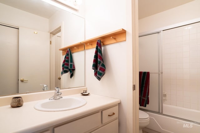 260 S 2nd Ave Unit 51, Ketchum, ID 83340 - bathroom with toilet, enclosed tub / shower combo, and vanity