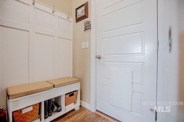 mudroom with light wood-style flooring