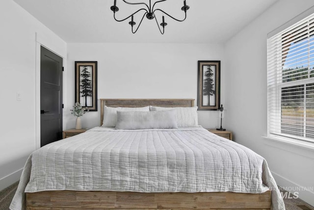 bedroom with an inviting chandelier