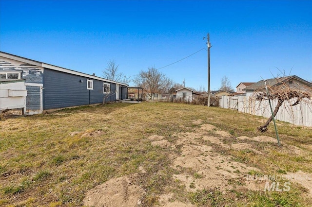 view of yard featuring a fenced backyard