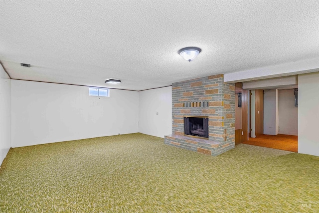1332 Burrell Ave, Lewiston, ID 83501 - below grade area featuring a stone fireplace, carpet, and a textured ceiling