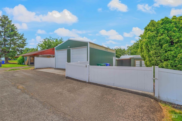 1332 Burrell Ave, Lewiston, ID 83501 - view of front of house with a detached garage and an outbuilding