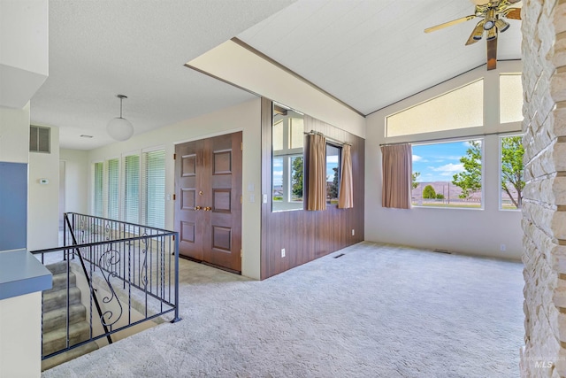 1332 Burrell Ave, Lewiston, ID 83501 - empty room with carpet, ceiling fan, and lofted ceiling