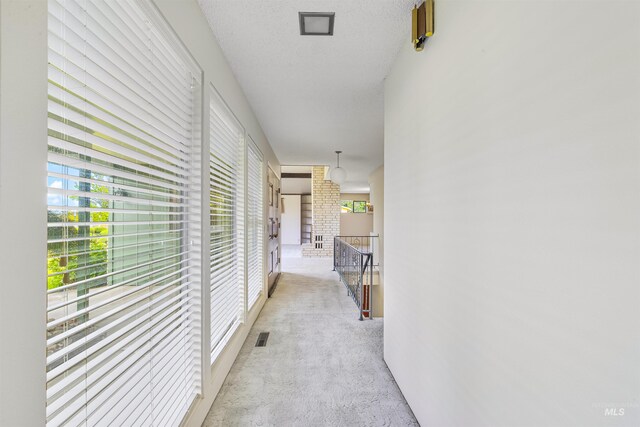 1332 Burrell Ave, Lewiston, ID 83501 - hallway with light carpet