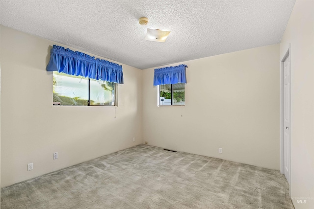 1332 Burrell Ave, Lewiston, ID 83501 - carpeted spare room featuring a smoke detector and a textured ceiling