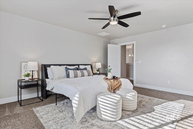 carpeted bedroom with ceiling fan