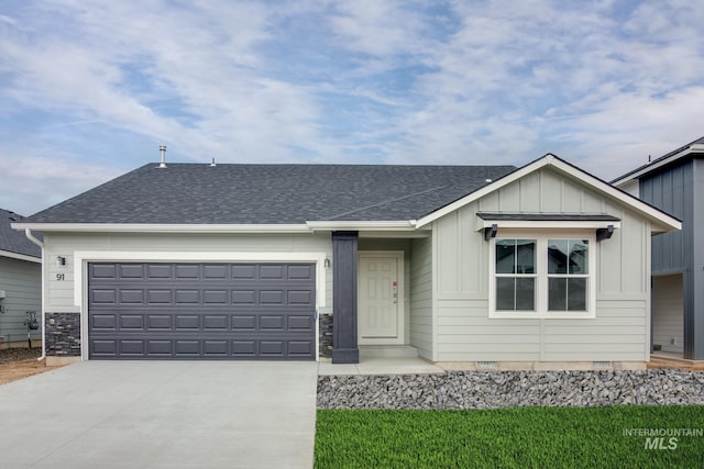 ranch-style home featuring a garage