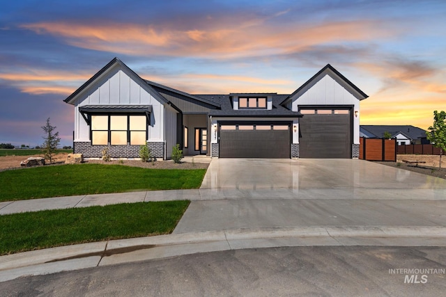 7760 W Flathead Lake St, Eagle, ID 83616 - modern farmhouse style home with a garage, board and batten siding, driveway, and a yard