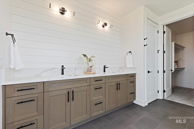 7760 W Flathead Lake St, Eagle, ID 83616 - full bathroom featuring double vanity, tile patterned flooring, and wooden walls