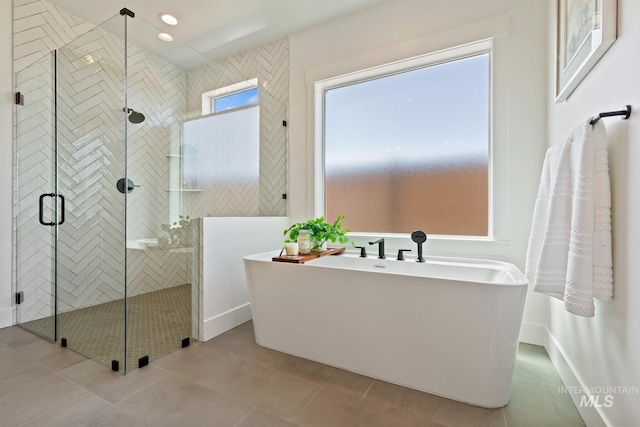 7760 W Flathead Lake St, Eagle, ID 83616 - full bath featuring a freestanding bath, a shower stall, recessed lighting, and tile patterned floors
