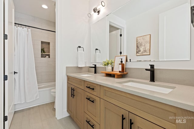 7760 W Flathead Lake St, Eagle, ID 83616 - full bathroom featuring double vanity, shower / bath combo with shower curtain, and recessed lighting