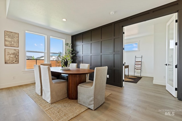 7760 W Flathead Lake St, Eagle, ID 83616 - dining space featuring light wood-style floors and recessed lighting