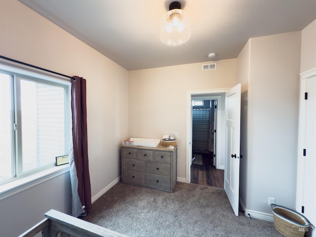bedroom featuring carpet