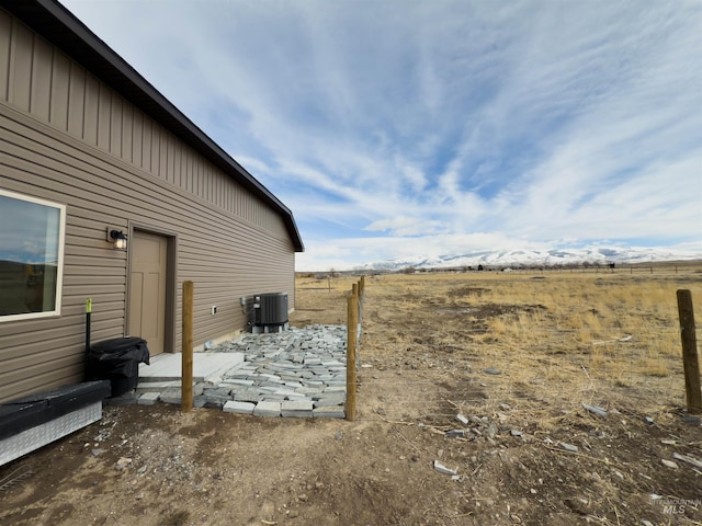view of yard featuring central AC unit
