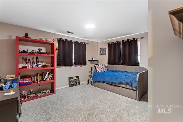 carpeted bedroom with visible vents