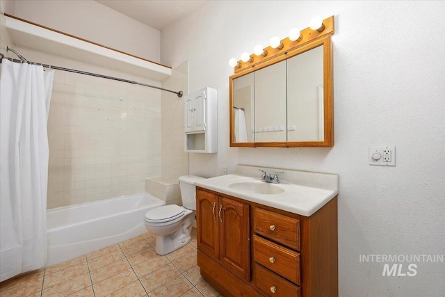 full bathroom featuring toilet, vanity, tile patterned flooring, and shower / tub combo with curtain