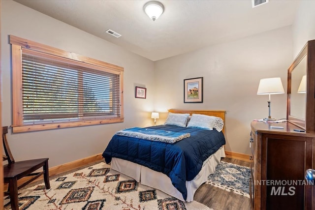 bedroom featuring light hardwood / wood-style floors