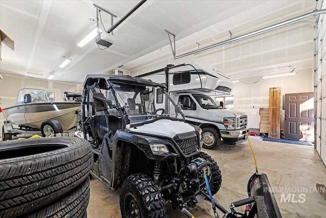 garage featuring a garage door opener