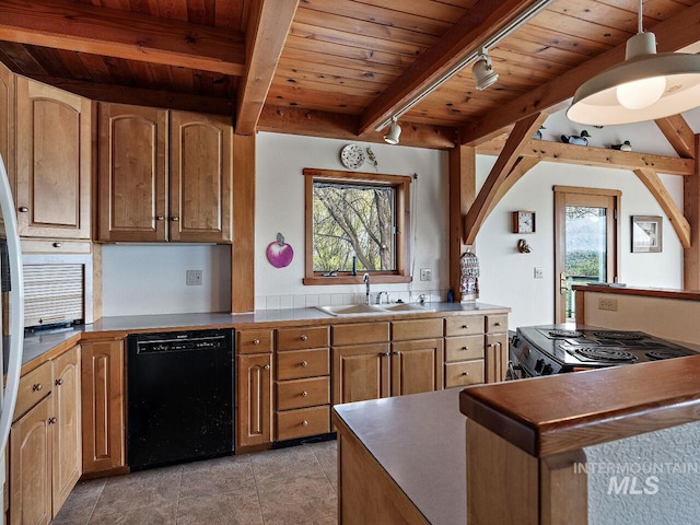 kitchen featuring a healthy amount of sunlight, dishwasher, light tile floors, and beam ceiling