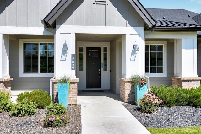 12039 N 19th Ave, Boise, ID 83714 - property entrance featuring a shingled roof, covered porch, and a standing seam roof