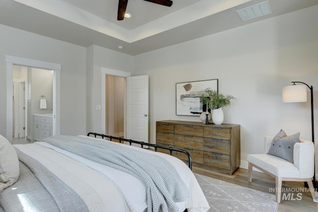 12039 N 19th Ave, Boise, ID 83714 - bedroom featuring wood finished floors, recessed lighting, and ensuite bath