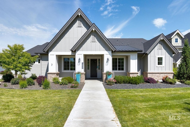 12039 N 19th Ave, Boise, ID 83714 - modern farmhouse featuring board and batten siding, a front yard, and brick siding