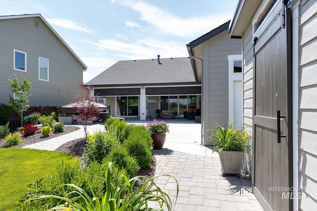 12039 N 19th Ave, Boise, ID 83714 - rear view of house featuring a patio