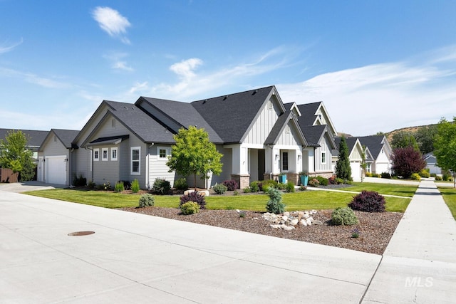 12039 N 19th Ave, Boise, ID 83714 - modern farmhouse with board and batten siding, a front yard, a residential view, an attached garage, and driveway