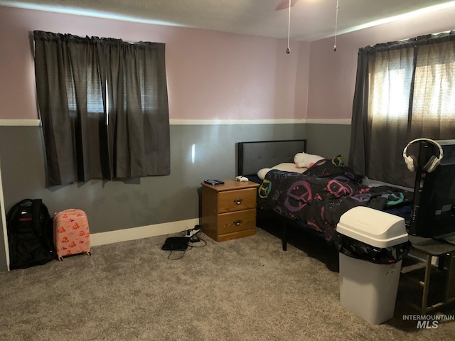 bedroom featuring ceiling fan and carpet flooring