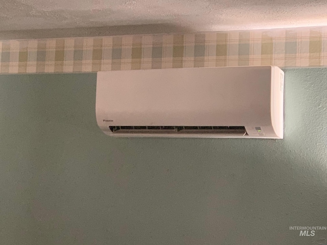 interior details featuring a wall mounted air conditioner